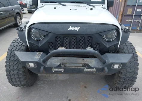 2016 Jeep Wrangler Unlimited Willys Wheeler из США, поврежденный, VIN 1C4BJWDG5GL210263